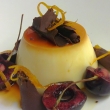Creme Caramel Panna Cotta - Amaretto biscuit - cherries - shaved chocolate